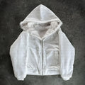 Casual loose-fitting cardigan-style coat in solid black or white colour with long sleeves