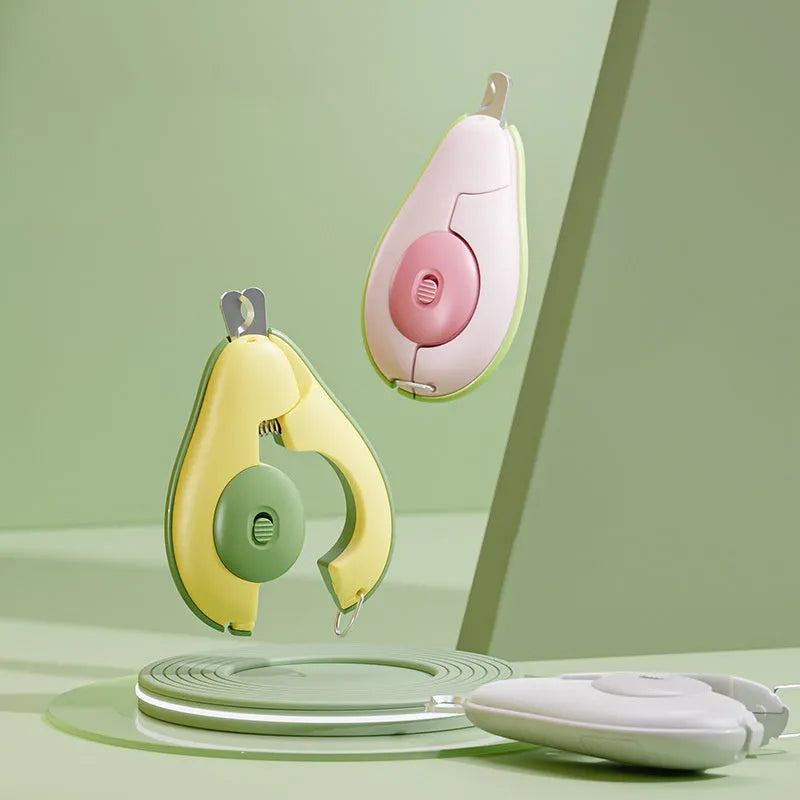 LED pet nail clipper with safety guard in green, pink and white colours for small dogs and cats