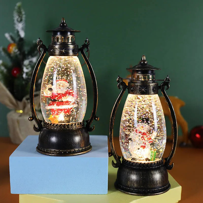 LED light-up crystal ball oil lamp Christmas ornament showing snowman or elderly figure design on a desktop.
