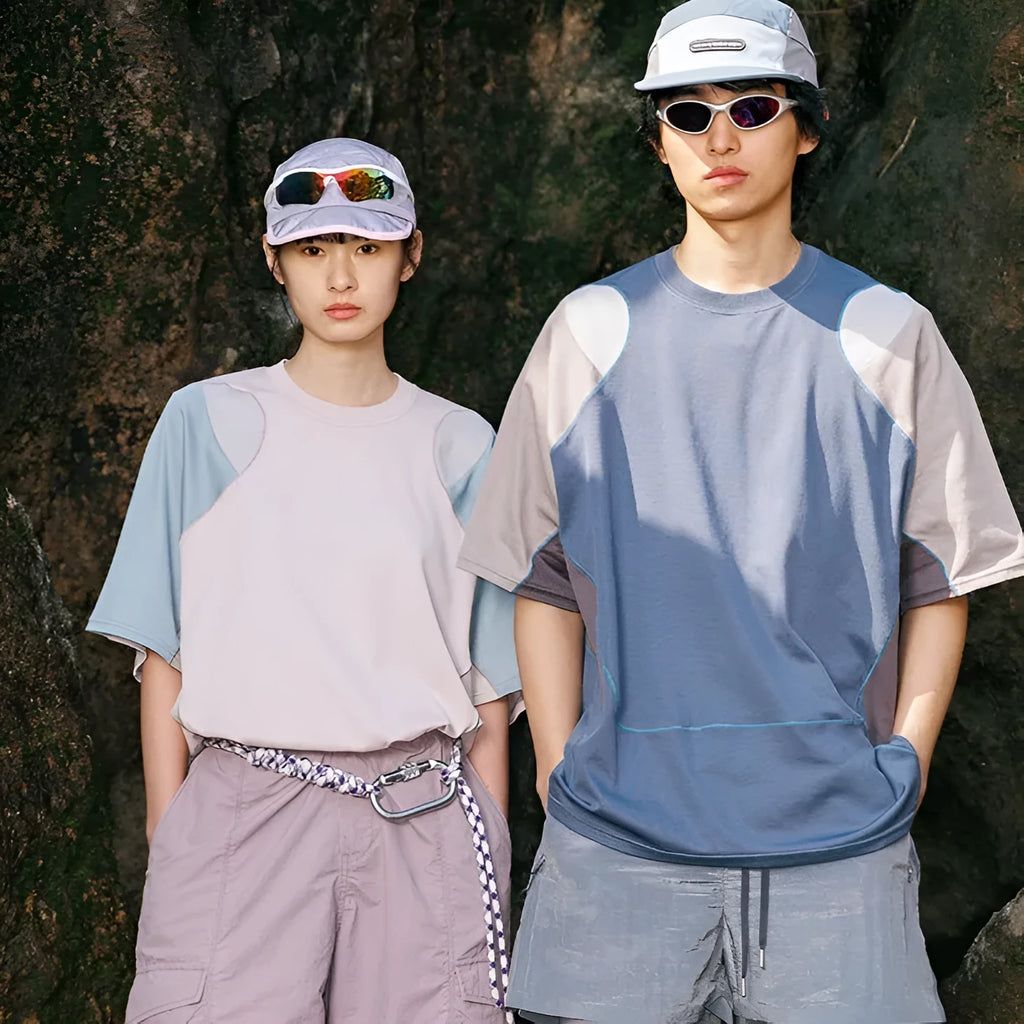 Men's loose blue patchwork contrast short sleeve cotton blend t-shirt on a hanger.