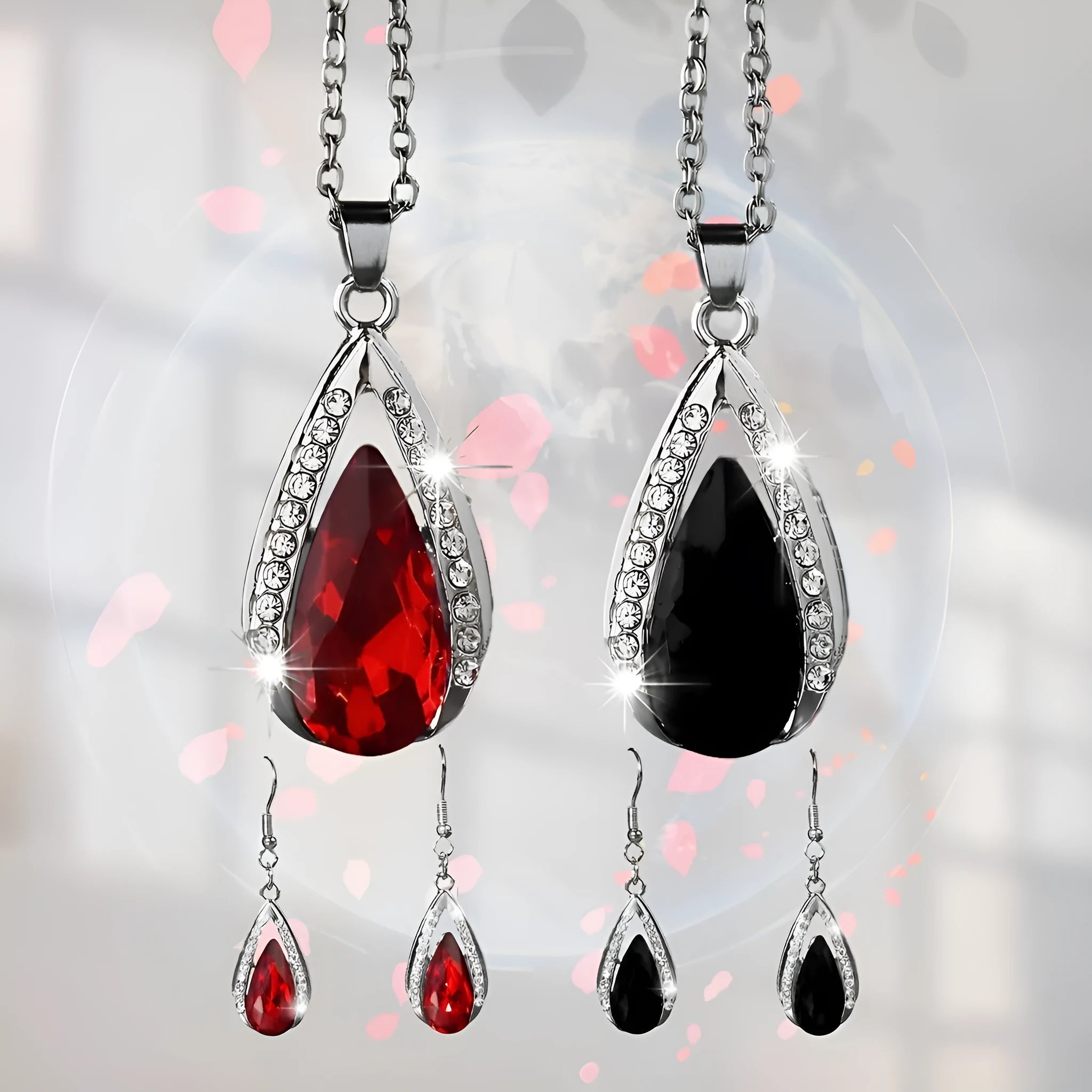 Teardrop glass pendant necklace and matching earrings set in black or red alloy jewellery