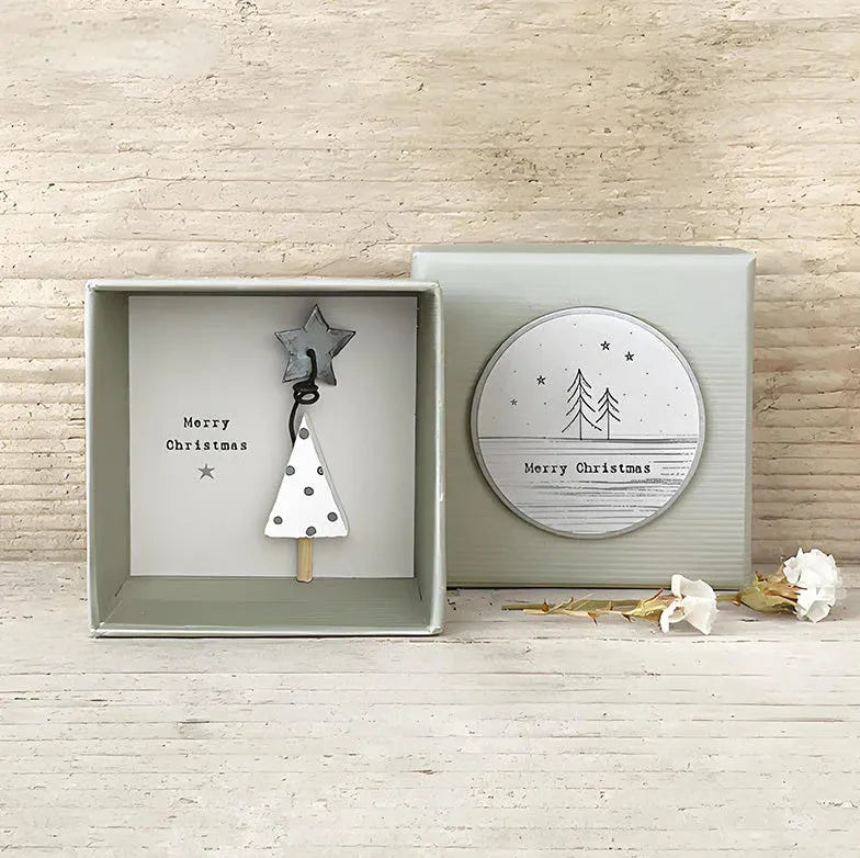 Boxed resin and plastic guardian angel figurine ornament in a modern cartoon style.