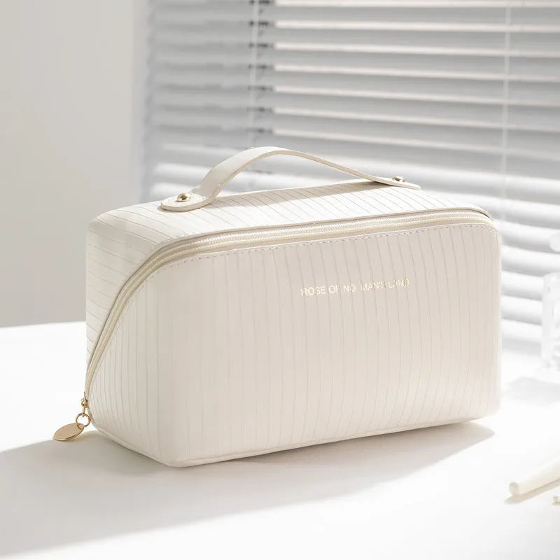 Vertical pattern pillow makeup bag showing cubic 22.5cm design with travel storage capacity