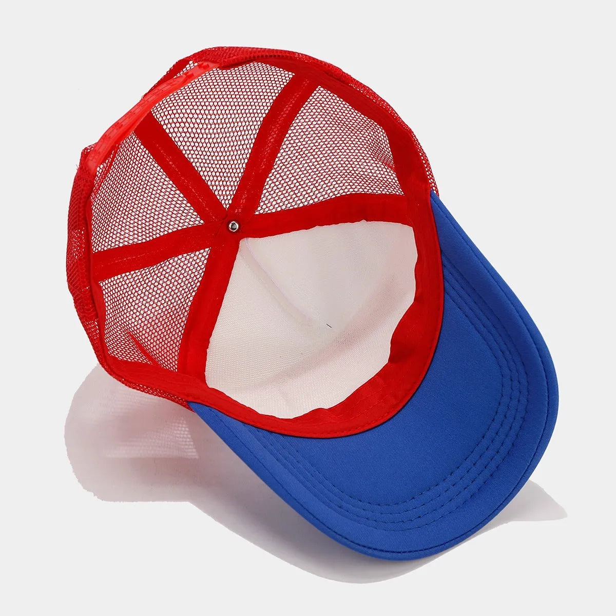Red and blue contrast baseball cap with mesh breathable crown and adjustable strap