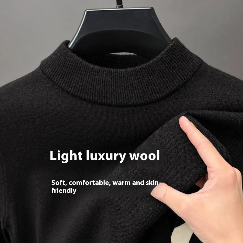 Men's fine wool half turtleneck pullover in a solid colour, shown in regular fit with long sleeves.