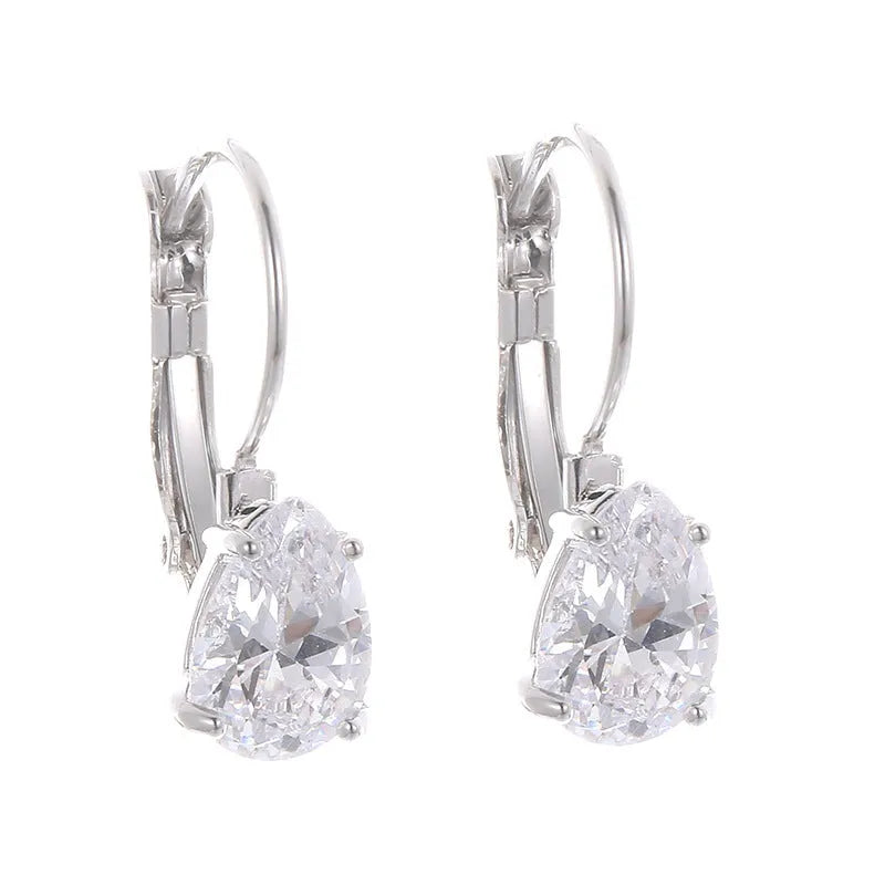 Drop-shaped copper fashion earrings with gemstone inlays in gold or platinum colour finishes