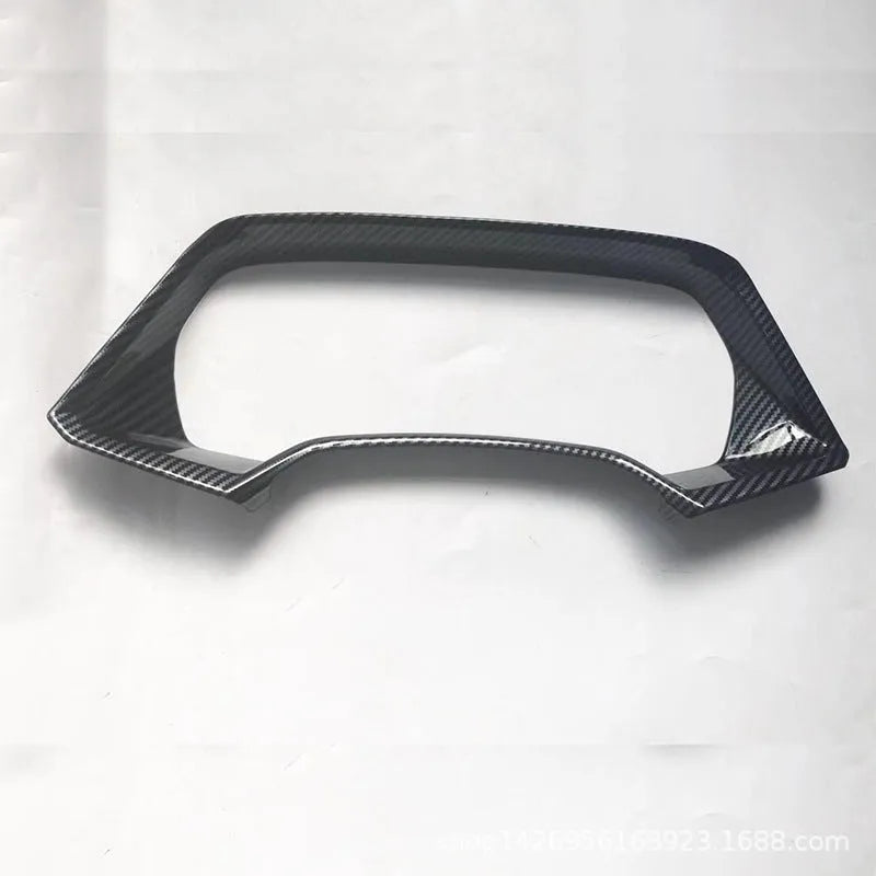 BMW X5L dashboard decorative frame in carbon fibre and peach wood finishes