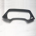 BMW X5L dashboard decorative frame in carbon fibre and peach wood finishes