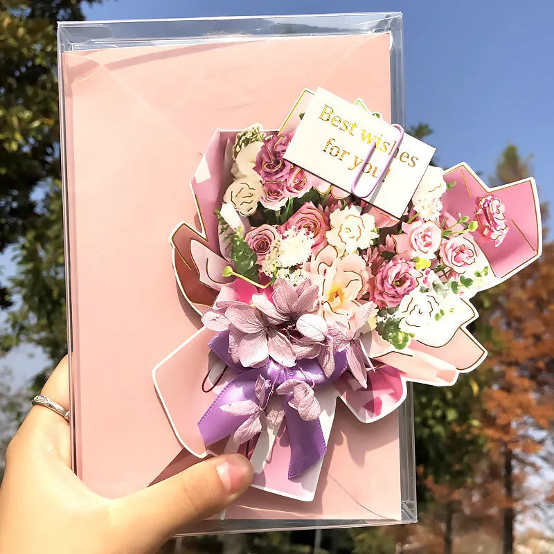 Handmade 3D butterfly-shaped birthday card with artificial flowers and hot foil stamping details.