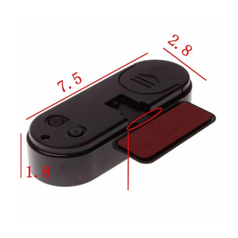 Black car dashboard clock thermometer with luminous LED display showing time and temperature
