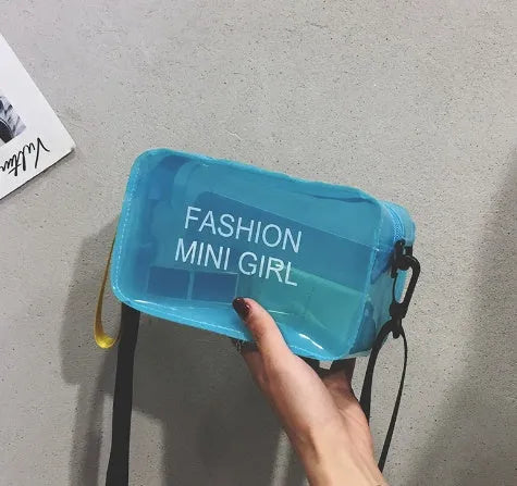 Transparent square jelly shoulder bag with adjustable strap showing internal mobile phone compartment