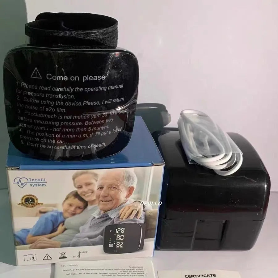 Black wrist blood pressure monitor with digital display and adjustable cuff.