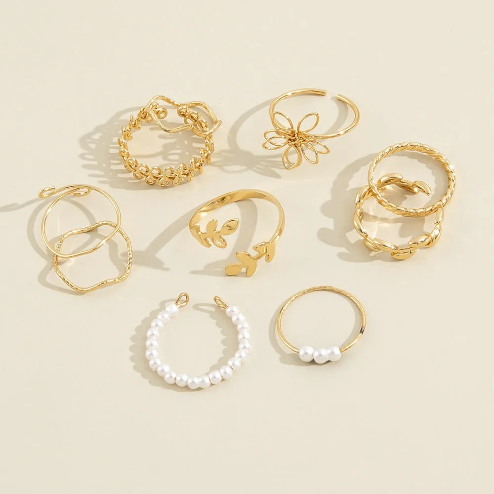 Women's gold openwork flower ring set with glossy electroplated finish