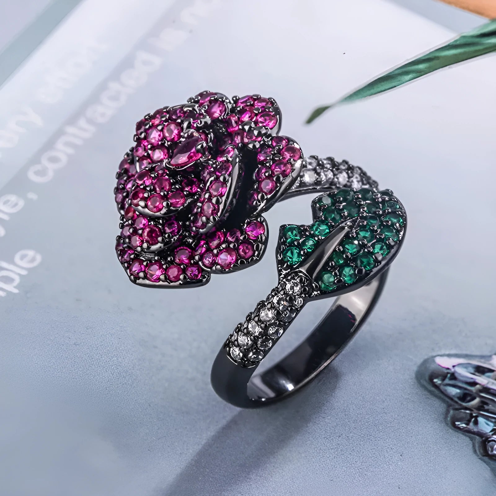 Geometric black gold flower personality ring for women on a copper base.
