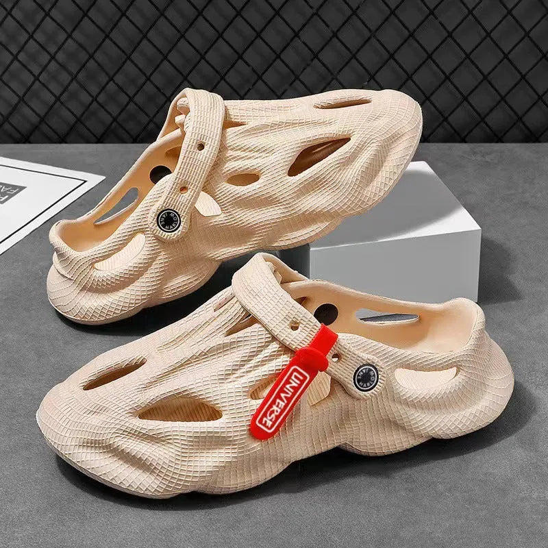 Pair of grey closed-toe EVA coconut slippers on a solid background, showing the frosted finish and cap style.