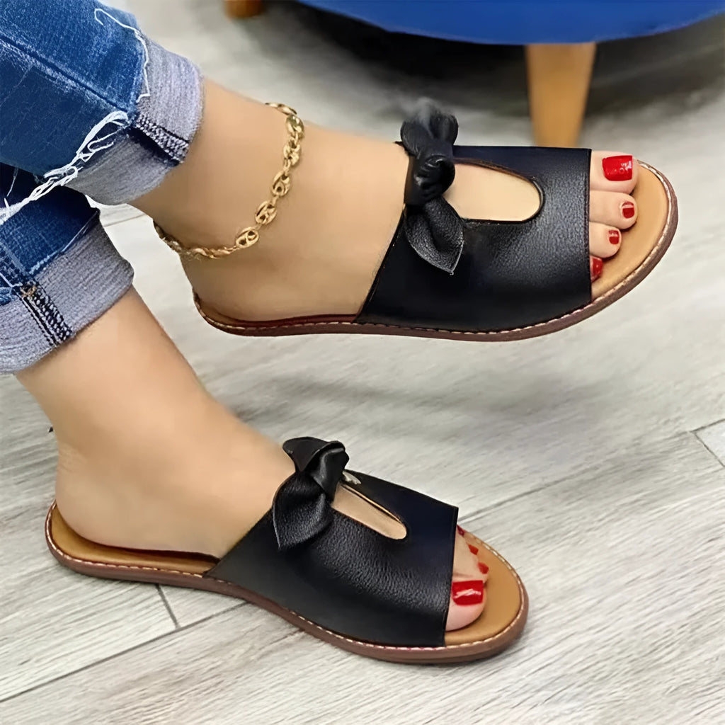 Ladies casual sandals with fish mouth open toe and bow detail in black, pink or gold