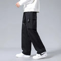 Boys' straight leg cargo pants in army green with large pockets and a drawstring waistband.