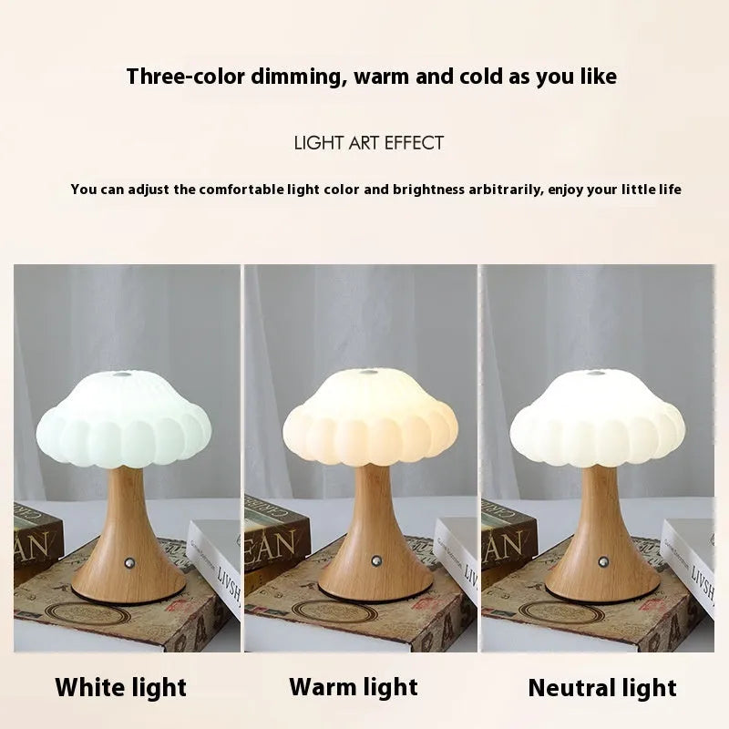 Wood grain coloured mushroom-shaped touch control night light on a wooden surface.
