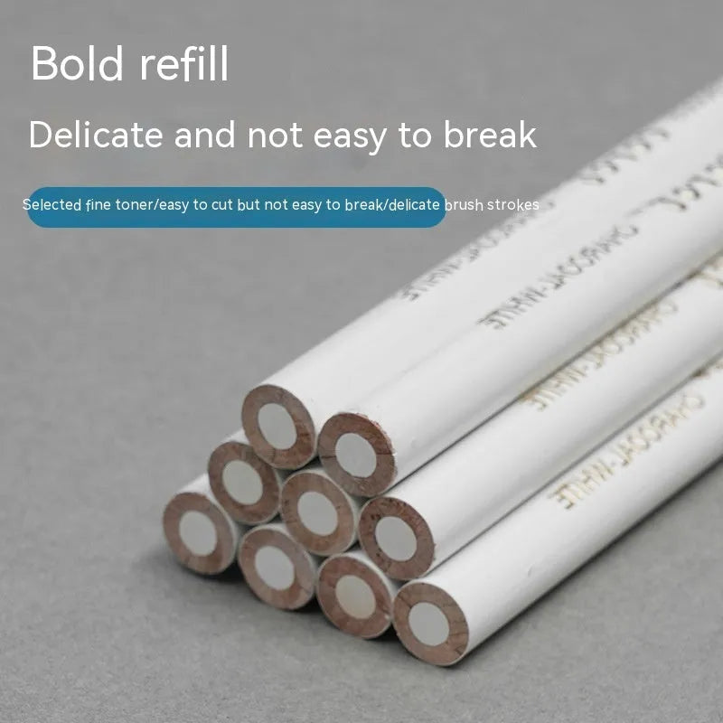 Set of three white charcoal pencils with wooden barrels and moderate hardness