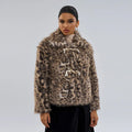 Women's leopard print polyester coat with buckle lapel detail showing regular sleeves and mid-length design