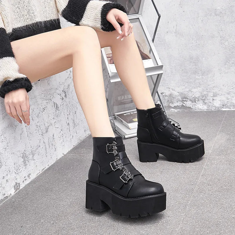 Black women's Harajuku punk ankle boots with bat buckle, thick heel, and side zip.