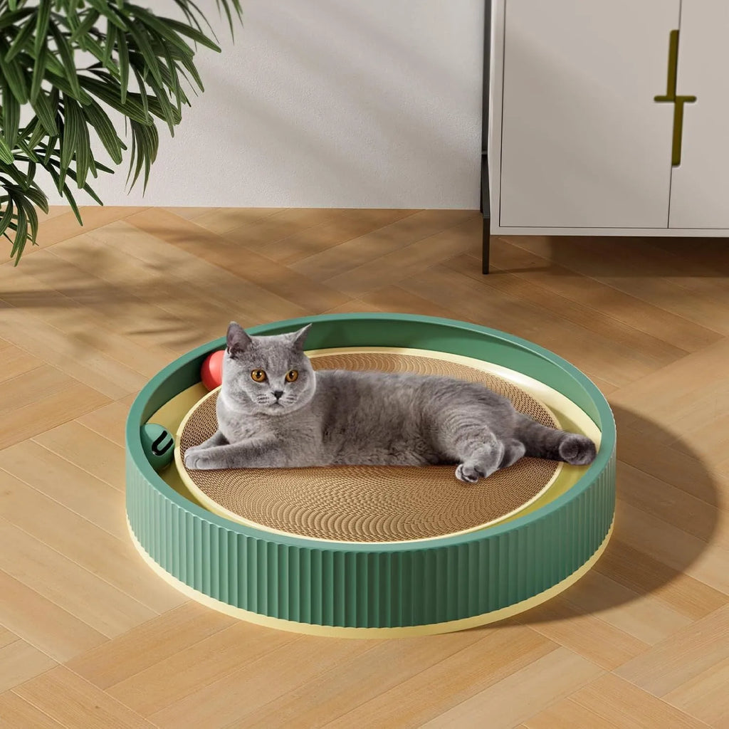 Large green circular cat scratching board with replaceable core and integrated ball toys