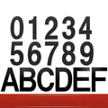 Black stainless steel adhesive house number sign showing digit 7, 7.5cm tall on adhesive backing.