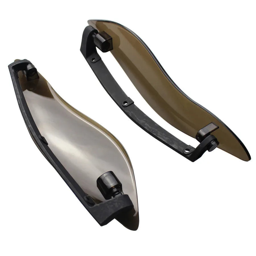 Set of two smoked ABS plastic side wings for a Harley three-wheel motorcycle windshield.