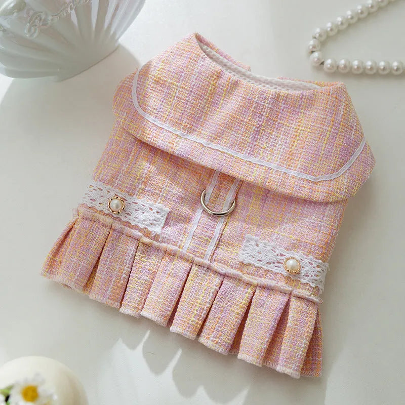 Polyester pet clothes for cats and small dogs in purple and pink colours showing four size options