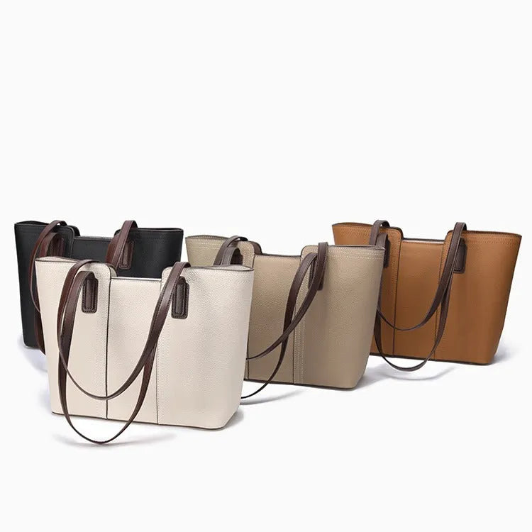 Genuine leather box-type shoulder bag in khaki colour with a sewing line detail and sandwich pocket.