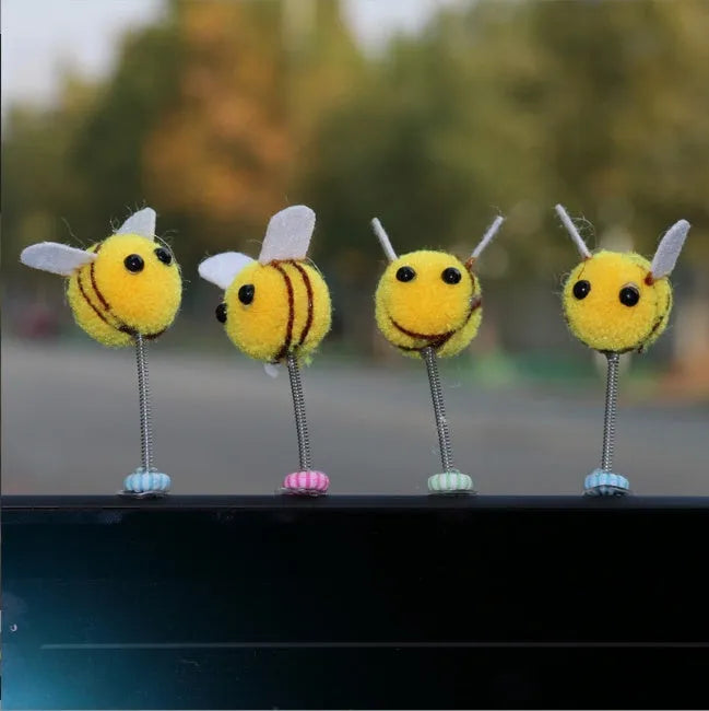 Square fur ball cartoon bee car decoration with black and yellow colours