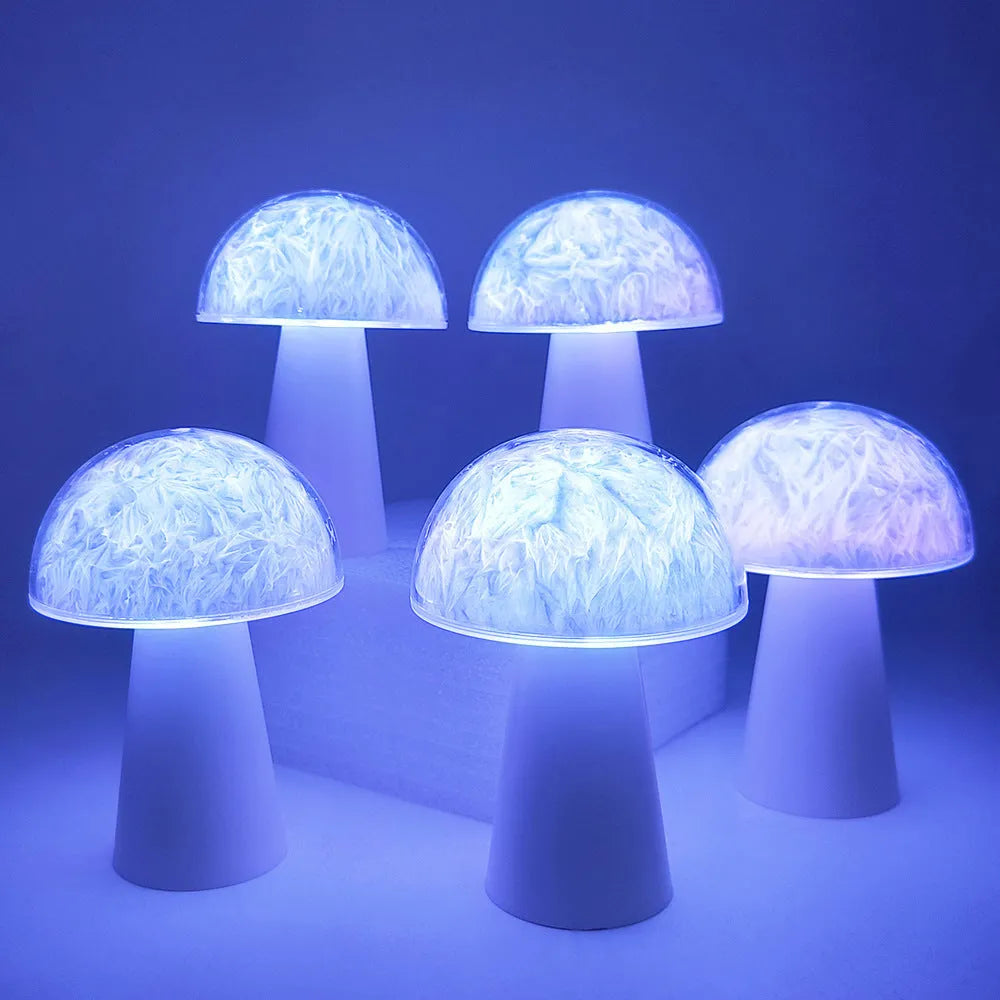 Mushroom-shaped RGB colour changing ambience lamp with remote control on wooden surface