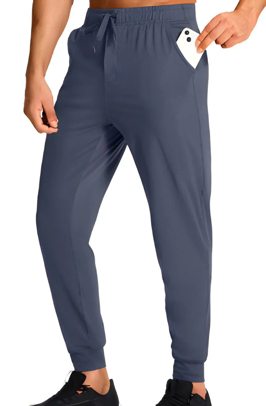 Men's loose fit casual trousers in solid colour with relaxed cut available in multiple sizes