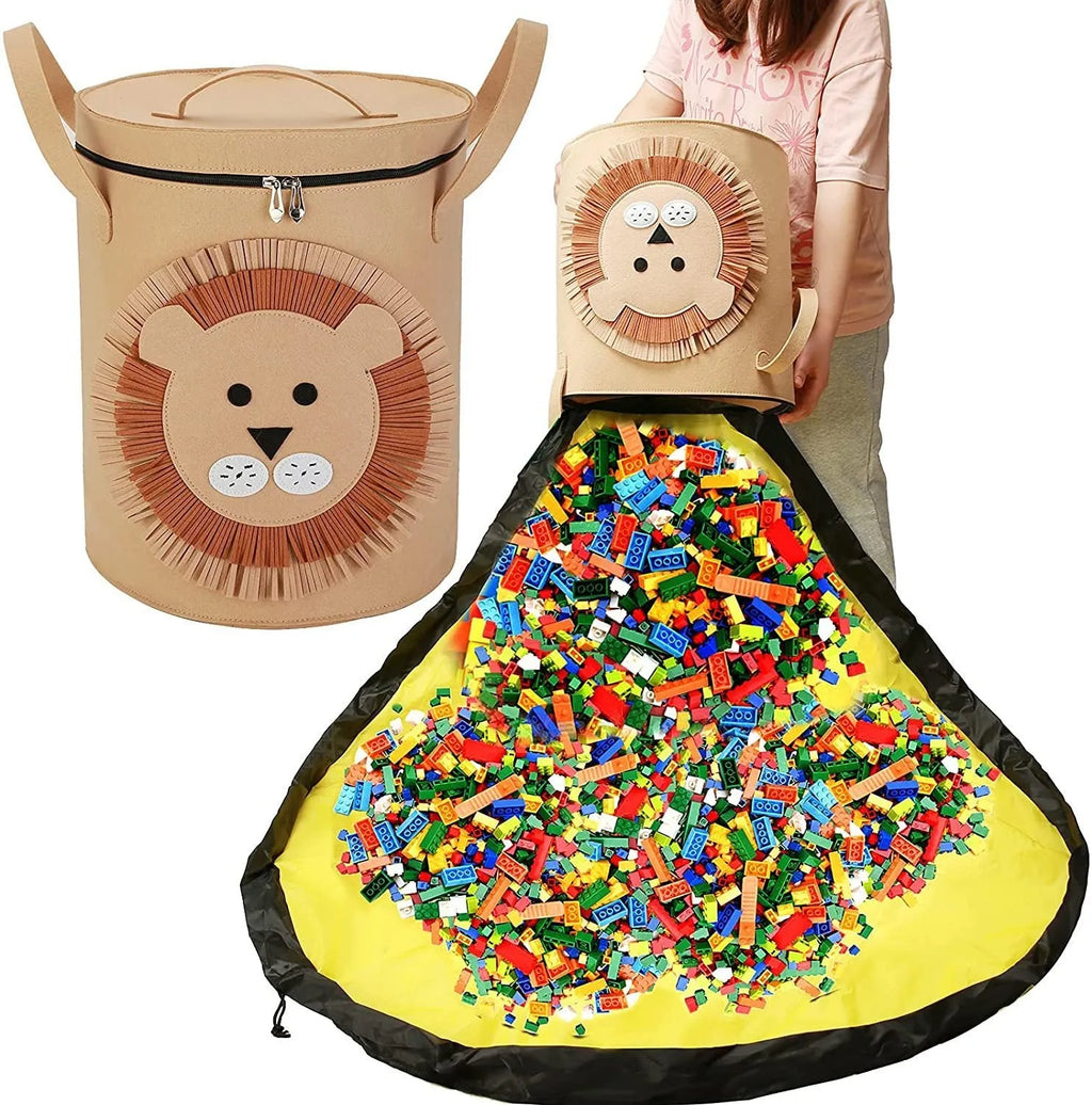 Green felt cube storage bag open as play mat with toys inside and pull rope visible