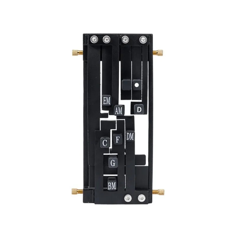 Black automatic guitar chord practice device for novice players on a folk guitar.