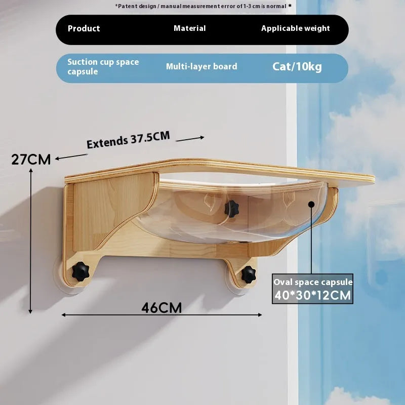 Space capsule suspended cat scratching post with sisal surface attached to window using suction cups