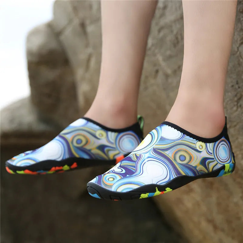 Beach wading shoes in multiple colours with Lycra upper and EVA midsole for swimming.