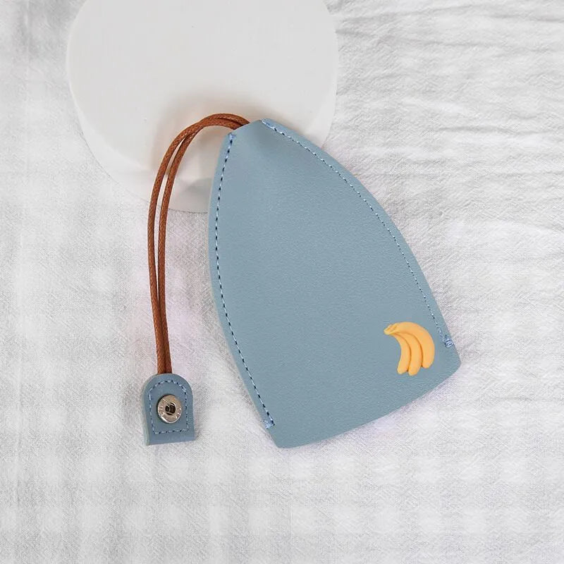 Cartoon style pull-out car key case made from PU leather in assorted designs