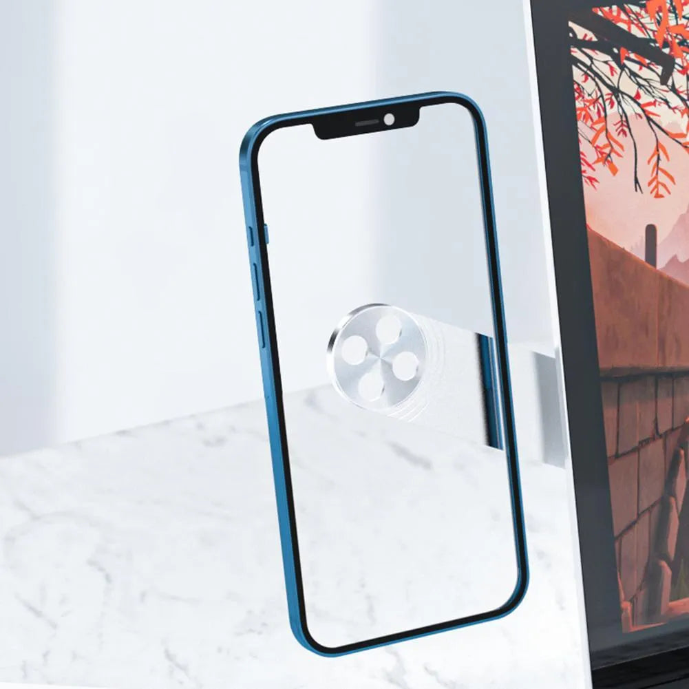 Black magnetic phone holder clipped to the side of a silver laptop, showing a smartphone attached.