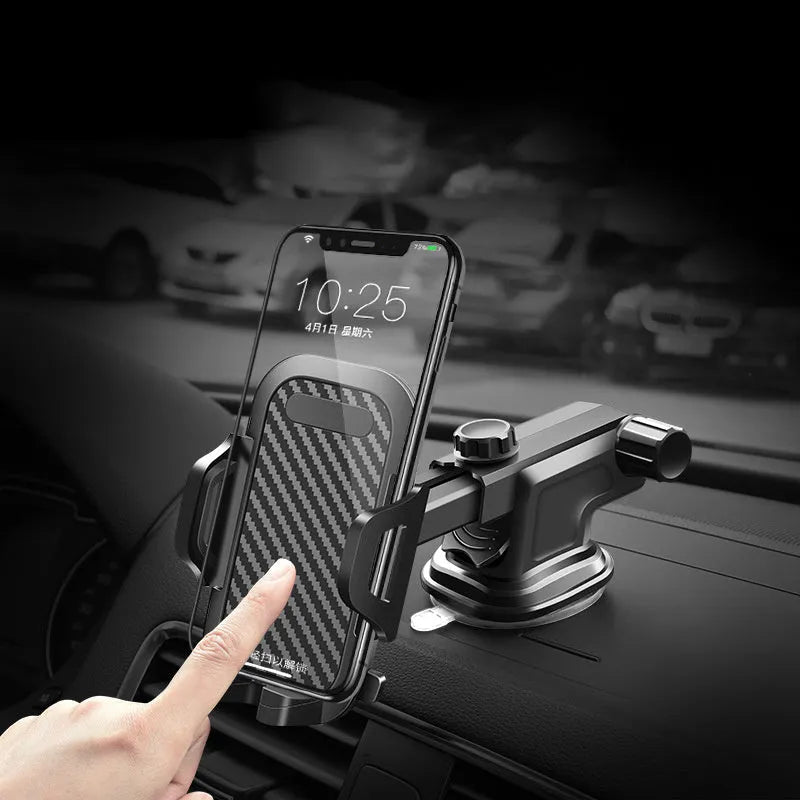 Black universal car phone holder mounted on a dashboard, gripping a large smartphone.