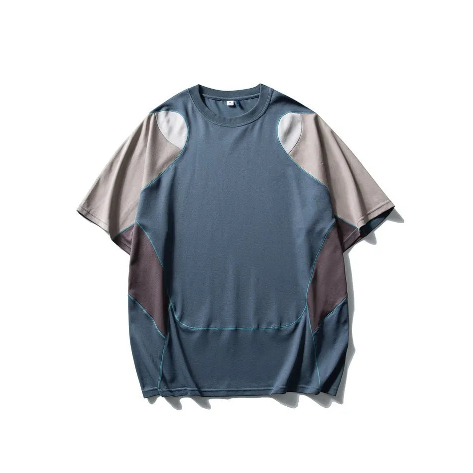 Men's loose blue patchwork contrast short sleeve cotton blend t-shirt on a hanger.
