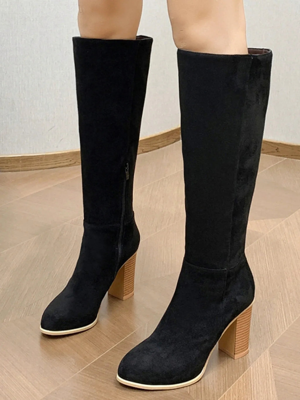 Women's black square toe high heel fashion boots made from artificial PU material