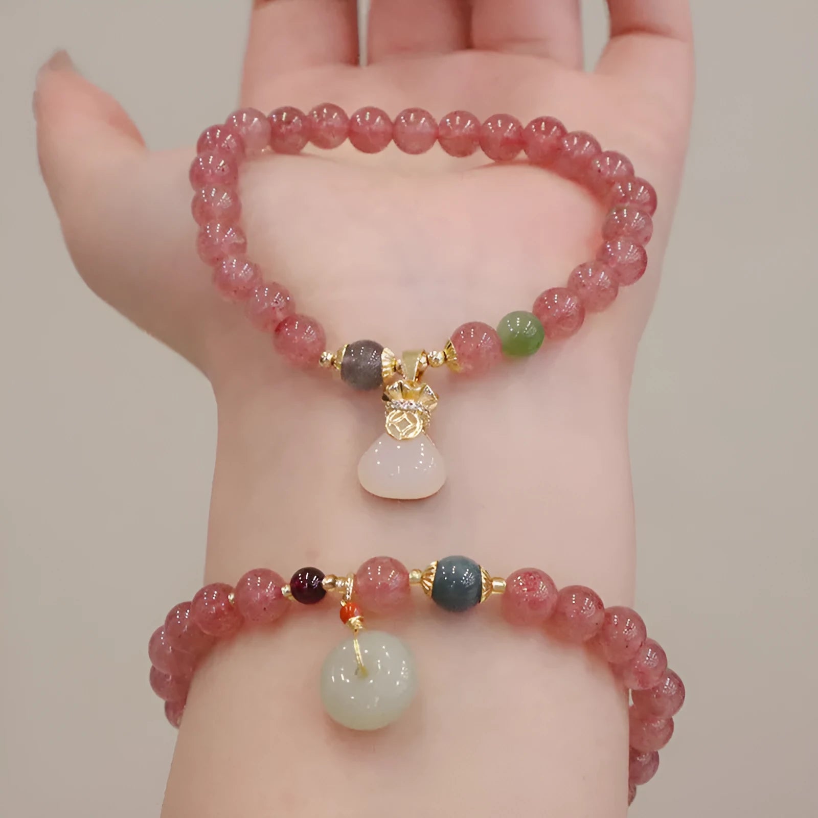 Strawberry quartz women's bracelet with geometric stone pattern and purse charm pendant
