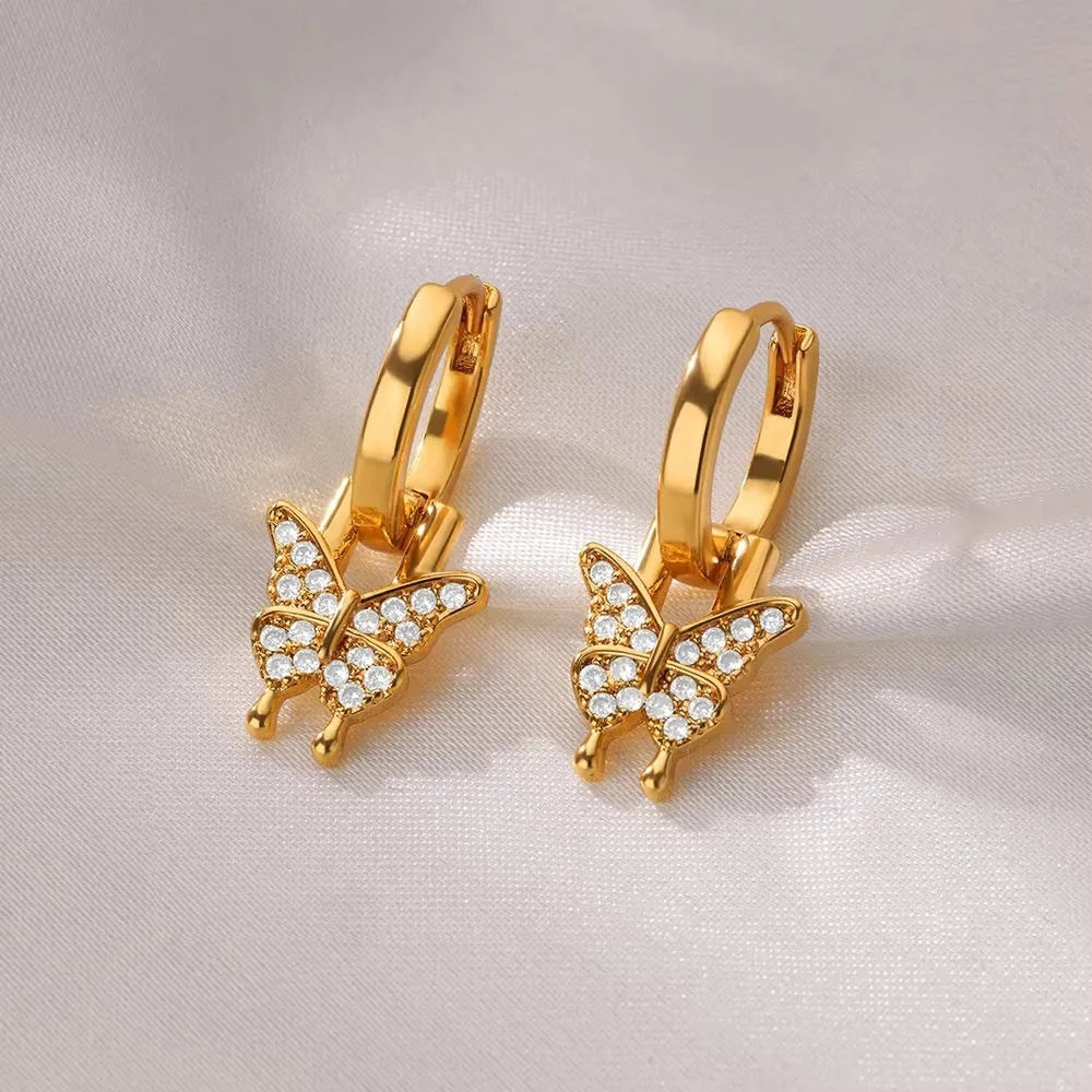 Women's geometric butterfly copper earrings with heart, bow, and star shapes in various colours