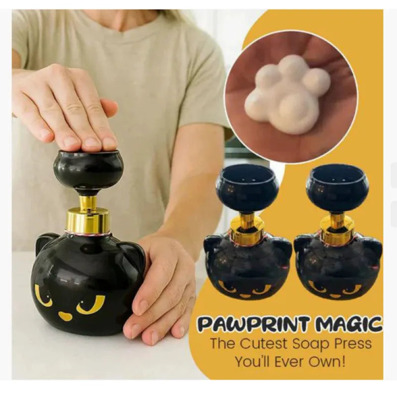 Black cartoon cat shaped plastic soap dispenser with manual pump, 10cm wide by 18cm high