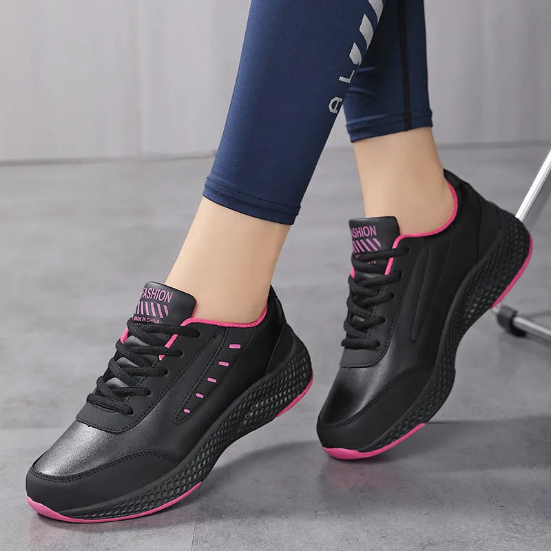 Women's PU leather casual sneakers with round toe and flat heel, solid colour low top design