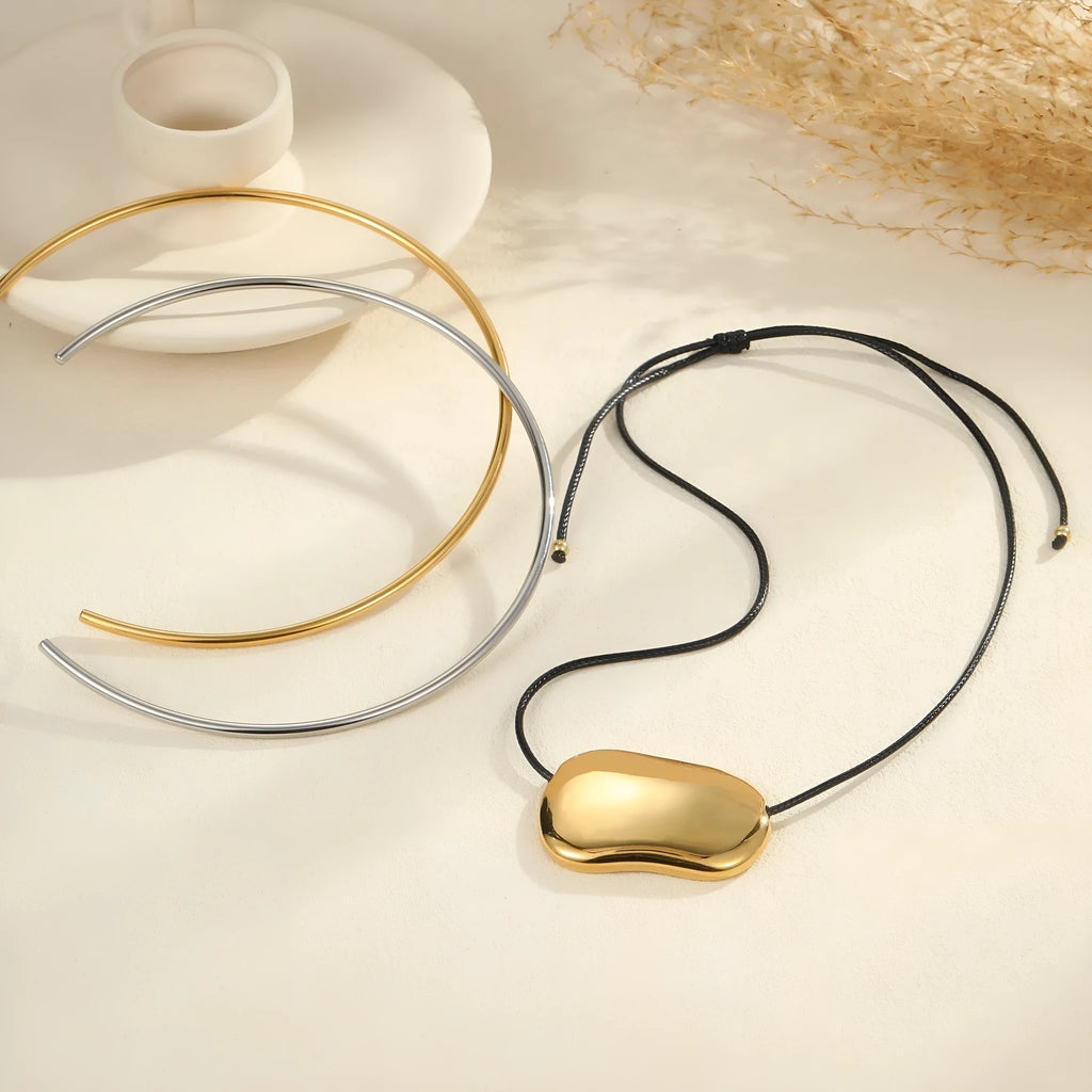 Titanium steel necklace with black rope design and irregular geometric pendant on adjustable chain
