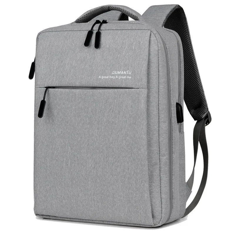 Waterproof Oxford cloth laptop backpack with rechargeable battery in black colour on a shoulder