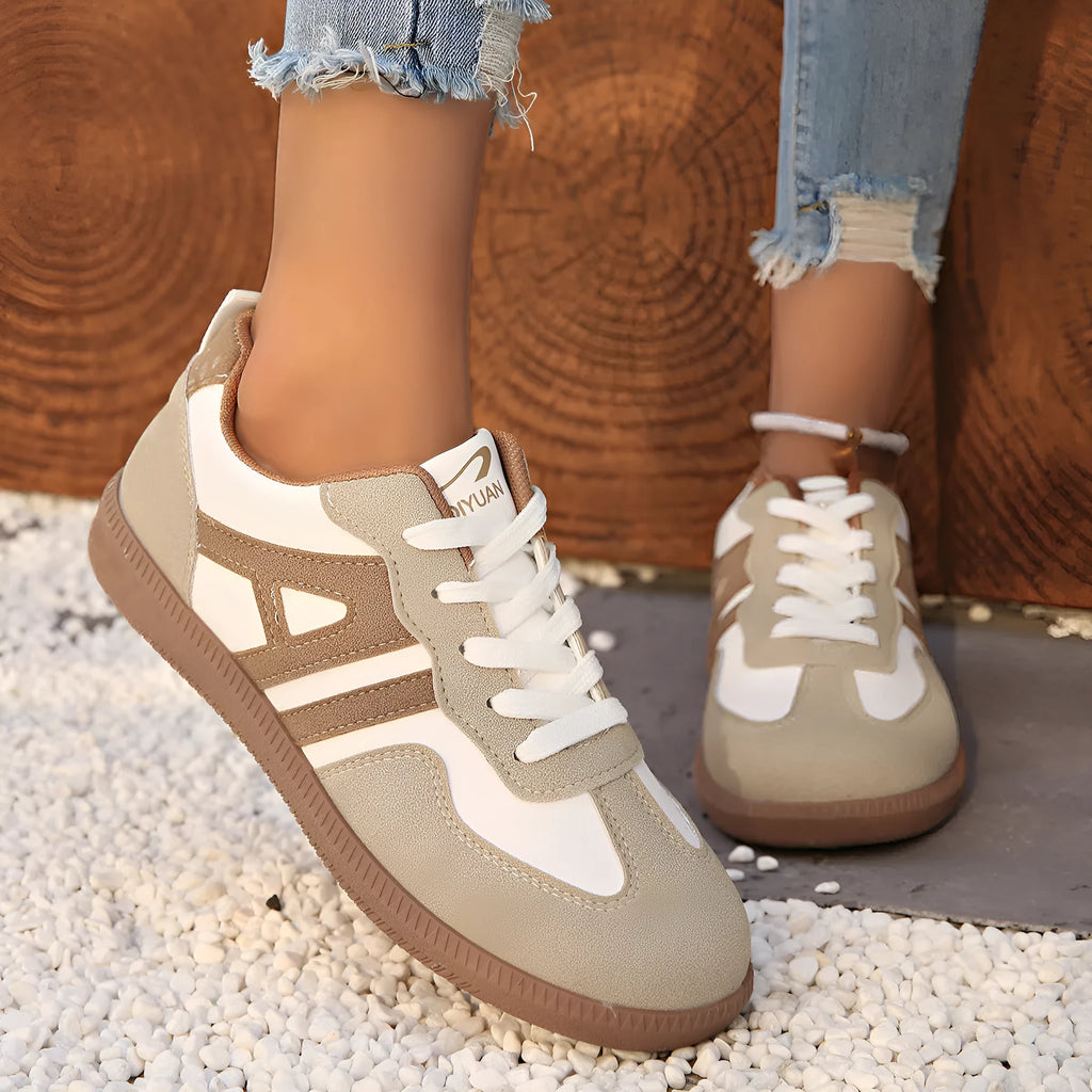 Women's retro lace-up jogging shoes in black, grey, or khaki with a platform heel and rubber sole.
