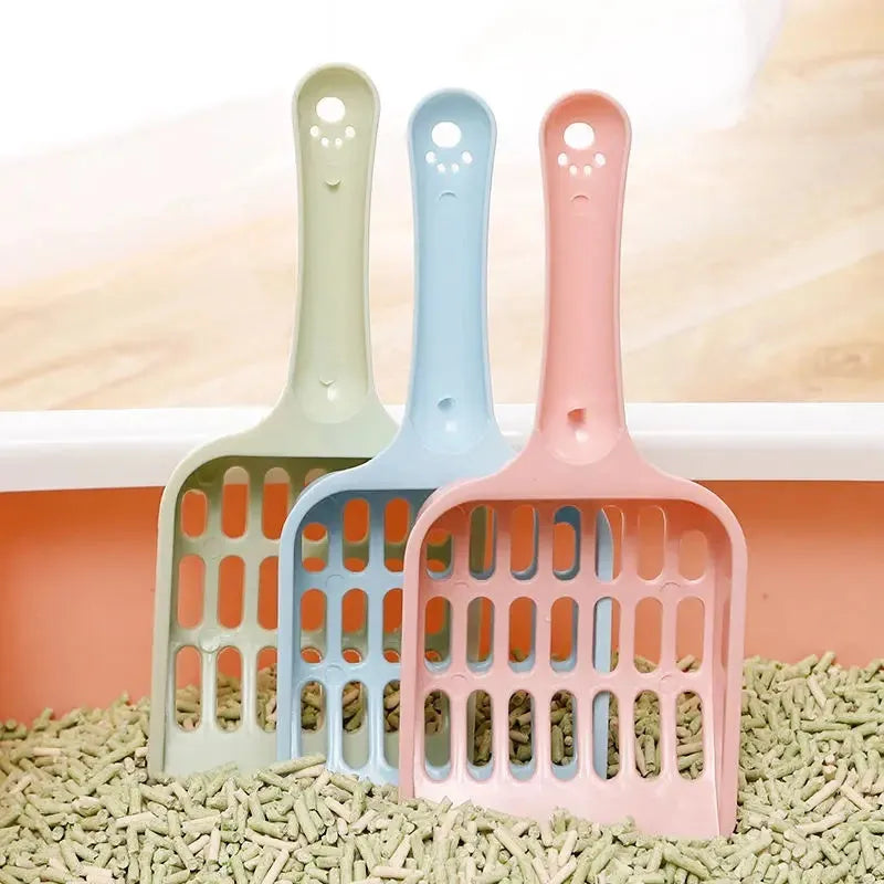 Blue plastic cat litter scoop measuring 20cm long for pet toilet cleaning
